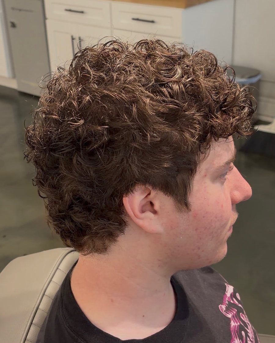 Curly top with a taper