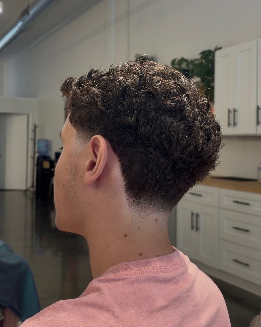 Textured crop with a skin fade, from behind